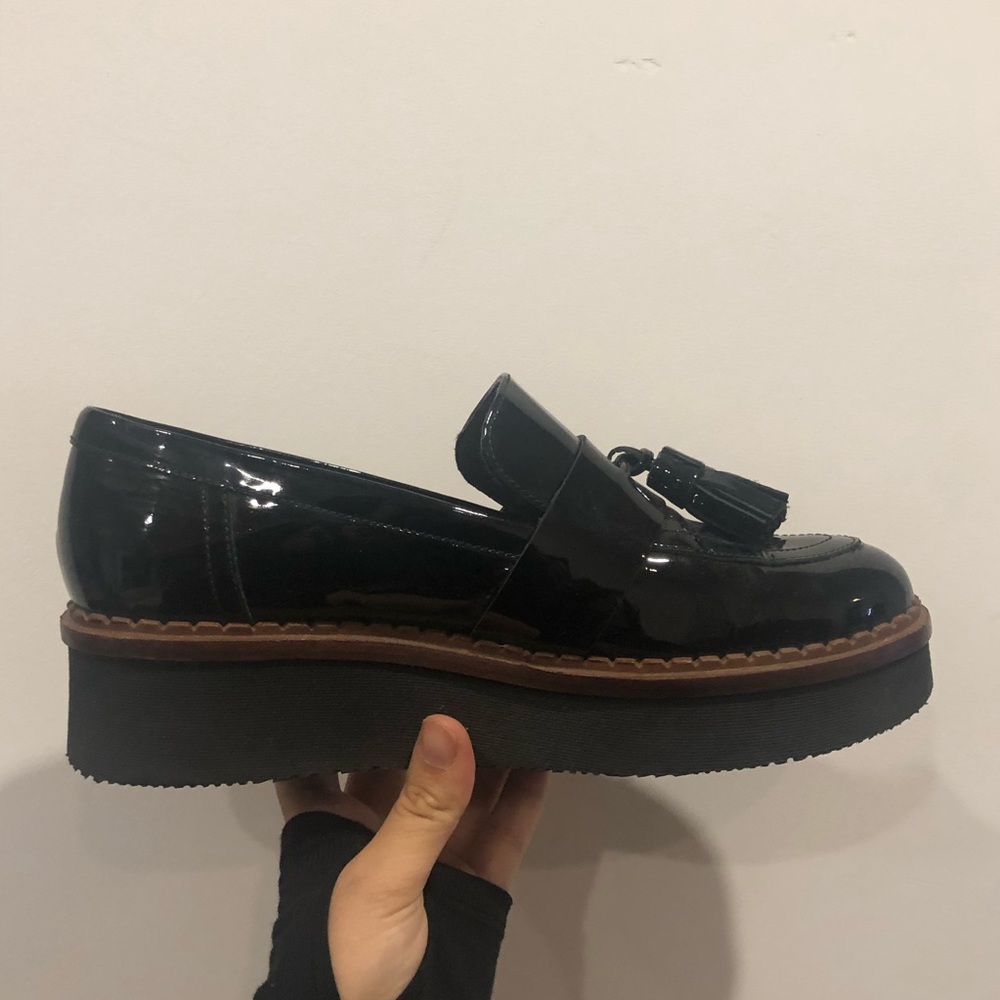 Patent leather platform loafers with tassels